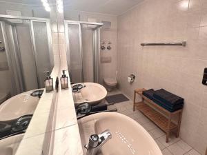 Koupelna v ubytování Ferienwohnung Oberstaufenblick + 37 fotografií