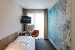 TV a/nebo společenská místnost v ubytování Hotel Chesa Monte 4Sterne Superior