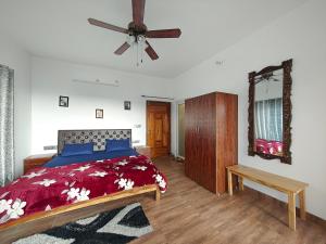 Postel nebo postele na pokoji v ubytování Abhi's Cottage