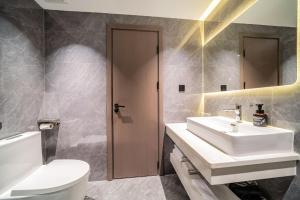 Koupelna v ubytování Mei Gang Hotel
