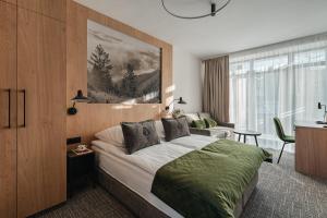 Postel nebo postele na pokoji v ubytování Rewita Zakopane + 37 fotografií