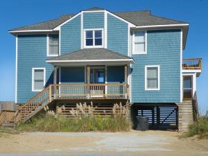 a large blue house with a large porch and a porch at KH5203- Katmantoo in Kitty Hawk