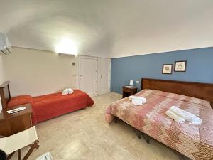 Posteľ alebo postele v izbe v ubytovaní Historic B&B Apartments Home + 14 fotografií