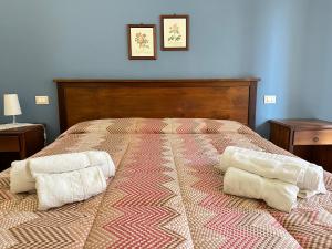 Posteľ alebo postele v izbe v ubytovaní Historic B&B Apartments Home