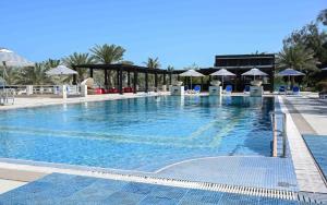 Kolam renang di atau dekat dengan I Like Al Hamra Palace - Elite Beach & Golf Resort Private Suites