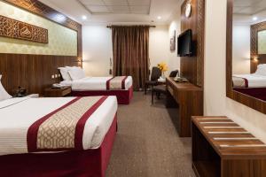 فندق مهد الرسالة 1 في مكة المكرمة: غرفة فندقية بسريرين وتلفزيون +37 صورة