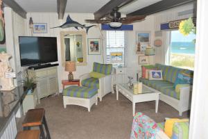 TV a/nebo společenská místnost v ubytování KH3637- Molasses Reef