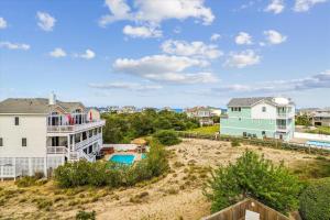an aerial view of a house and a pool at V1233- Easton's Beach in Corolla