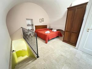 Posteľ alebo postele v izbe v ubytovaní Historic B&B Apartments Home