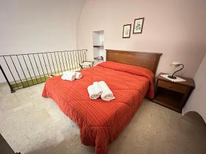 Posteľ alebo postele v izbe v ubytovaní Historic B&B Apartments Home