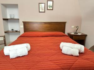 Posteľ alebo postele v izbe v ubytovaní Historic B&B Apartments Home