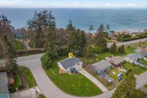 an aerial view of a house with a yellow balloon on it at Perch - Seascape Summit in Oak Harbor
