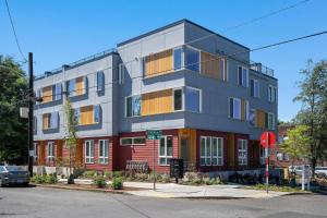 a building on the corner of a street at Perch - Urban Reflection 13 in Seattle