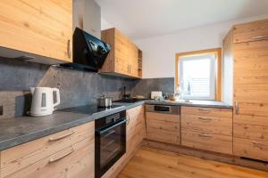 Cucina o angolo cottura di Apartments Sopherl - by myNests