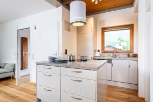 Cucina o angolo cottura di Apartments Sopherl - by myNests