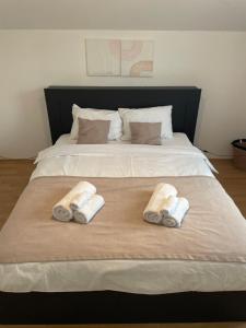 Postel nebo postele na pokoji v ubytování Apartman Magnolia