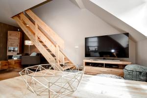 TV a/nebo společenská místnost v ubytování Apartmán s terasou