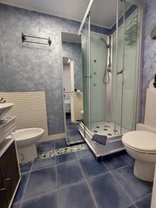 Koupelna v ubytování Nughe 'e' Oro Guesthouse + 23 fotografií