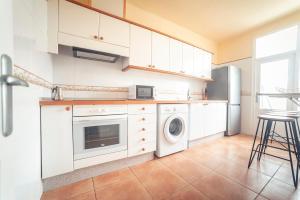 Kuchyň nebo kuchyňský kout v ubytování Apartamento Manuel Comellas
