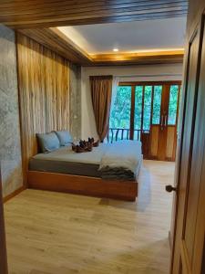 Postel nebo postele na pokoji v ubytování Dewshore Resort + 37 fotografií