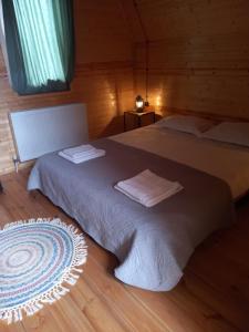 Ένα ή περισσότερα κρεβάτια σε δωμάτιο στο Welcome Cottage
