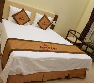 Postel nebo postele na pokoji v ubytování Anova 2 Hotel