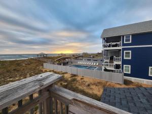 a house on the beach with a view of the ocean at KD1511- Sea Chanty in Kill Devil Hills