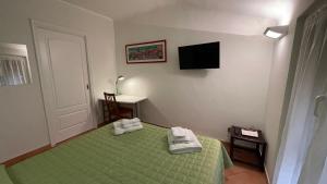 A bed or beds in a room at Nice House Near Park and Sea