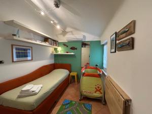 A bed or beds in a room at Nice House Near Park and Sea