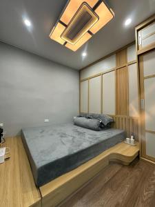 Postel nebo postele na pokoji v ubytování HaNoi HomeStay 43
