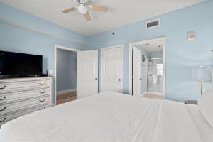 Ένα ή περισσότερα κρεβάτια σε δωμάτιο στο Laketown Wharf 802 +21 φωτογραφίες