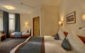 Postel nebo postele na pokoji v ubytování Trip Inn Hotel Hamm