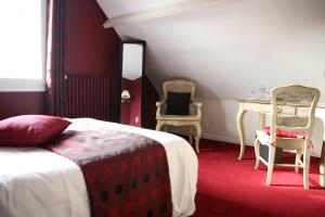 Postel nebo postele na pokoji v ubytování Cit'Hotel La Villa Julia