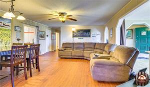 a living room with a couch and a table at Hole in the Wall Getaway - USA Mexico Border Bed and Breakfast in Columbus