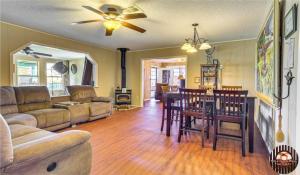 a living room with a couch and a table at Hole in the Wall Getaway - USA Mexico Border Bed and Breakfast in Columbus +67 photos