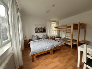 Postel nebo postele na pokoji v ubytování Ferienhaus Vera
