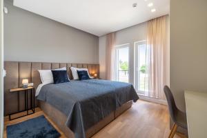 Ένα ή περισσότερα κρεβάτια σε δωμάτιο στο Exceptional Villa Idalia near ZADAR, NIN & QUEENS BEACH, Heated Pool, Privacy +28 φωτογραφίες