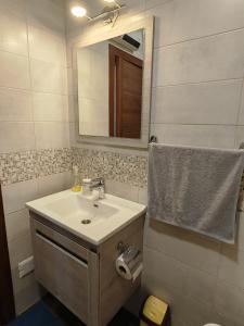 Baðherbergi á Apartman Monika Wind Resort