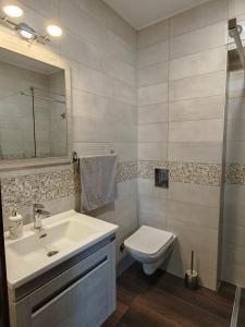 Baðherbergi á Apartman Monika Wind Resort