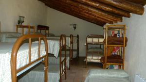 Bunk bed o mga bunk bed sa kuwarto sa Cortijo Covaroca