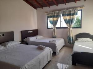 Ένα ή περισσότερα κρεβάτια σε δωμάτιο στο Apartamento Real Pólux