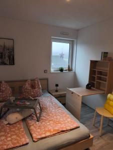 Postel nebo postele na pokoji v ubytování Apart Bellagast