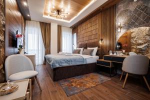 Katil atau katil-katil dalam bilik di Hotel Sedlo - Golija