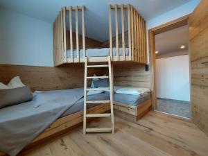 Postel nebo postele na pokoji v ubytování Hotel Gasthof Walcher