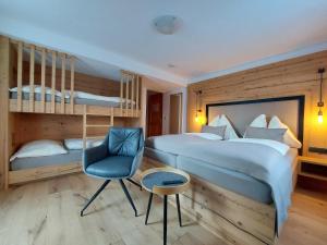Postel nebo postele na pokoji v ubytování Hotel Gasthof Walcher