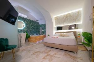 ETNEA 208 LUXURY JACUZZI SUITE Catania客房内的一张或多张床位