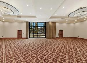 an empty room with a large room with a large window at The Lodge at Jackson Hole in Jackson