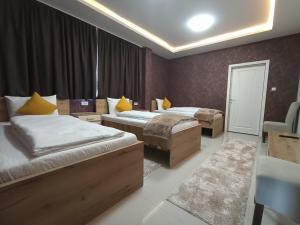 Voodi või voodid majutusasutuse Garnet Hotel & Event Centar toas