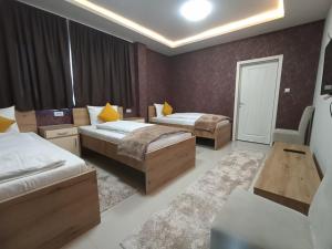 Voodi või voodid majutusasutuse Garnet Hotel & Event Centar toas