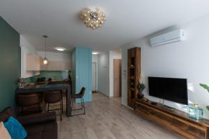 Et tv og/eller underholdning på Sunset Resort 102